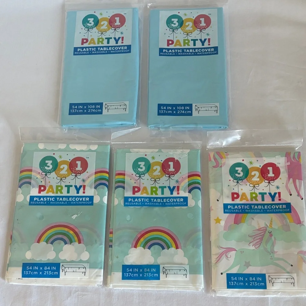 Lot of 5 Plastic Tablecovers 2 rainbow - 2 blue - 1 pastel Unicorn